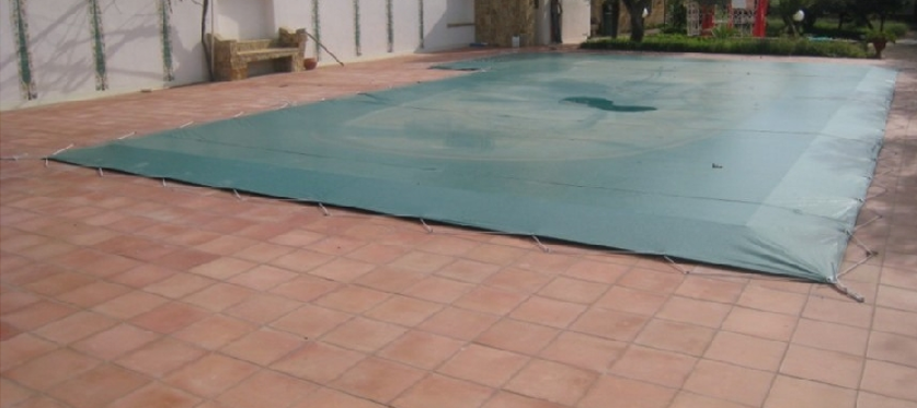 Telo invernale per piscina rettangolare con fascia, occhielli e cavo