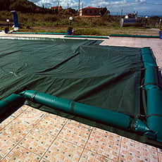 Copertura invernale con fascette senza tubolari per piscina rettangolare + scala romana - 400 g/mq